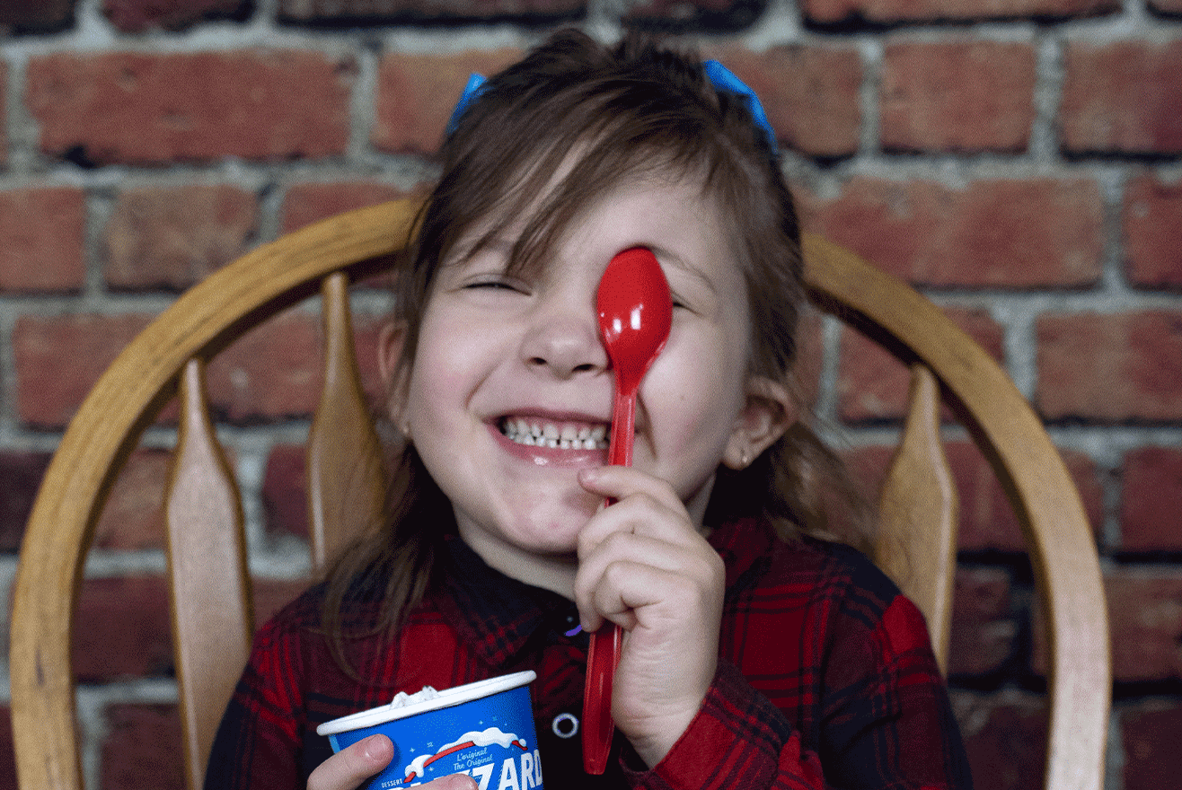 Young person enjoying a DQ Blizzard Treat