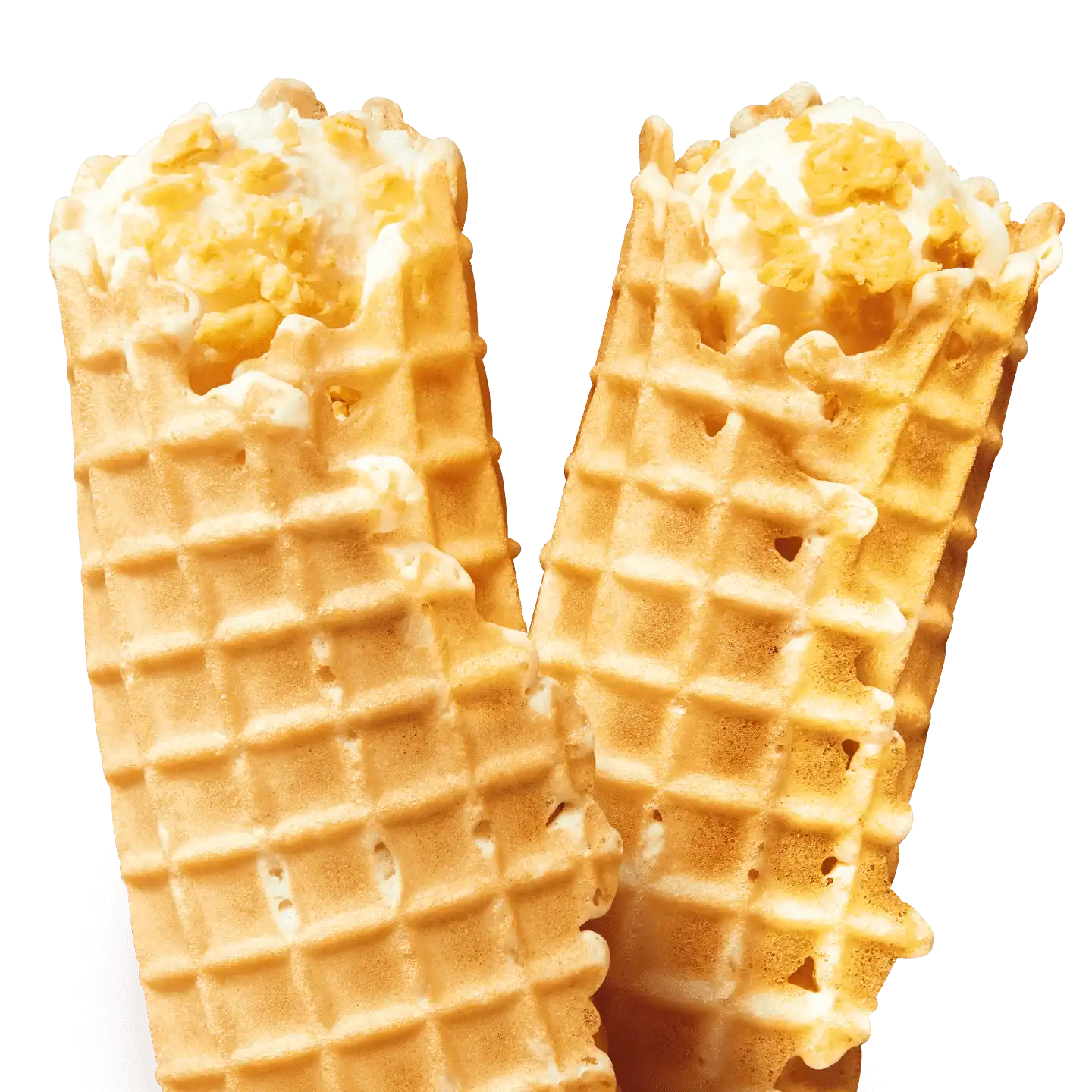 Dos Marquesitas DQ de galleta waffle dorada rellenas de helado cremoso con toppings, sobre fondo blanco.