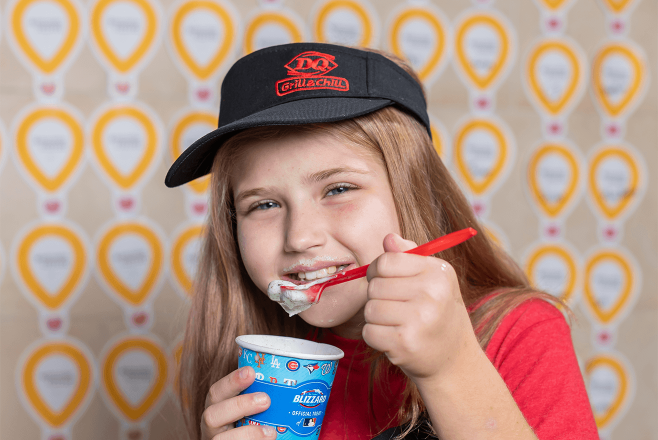 Young person enjoying a DQ Blizzard Treat