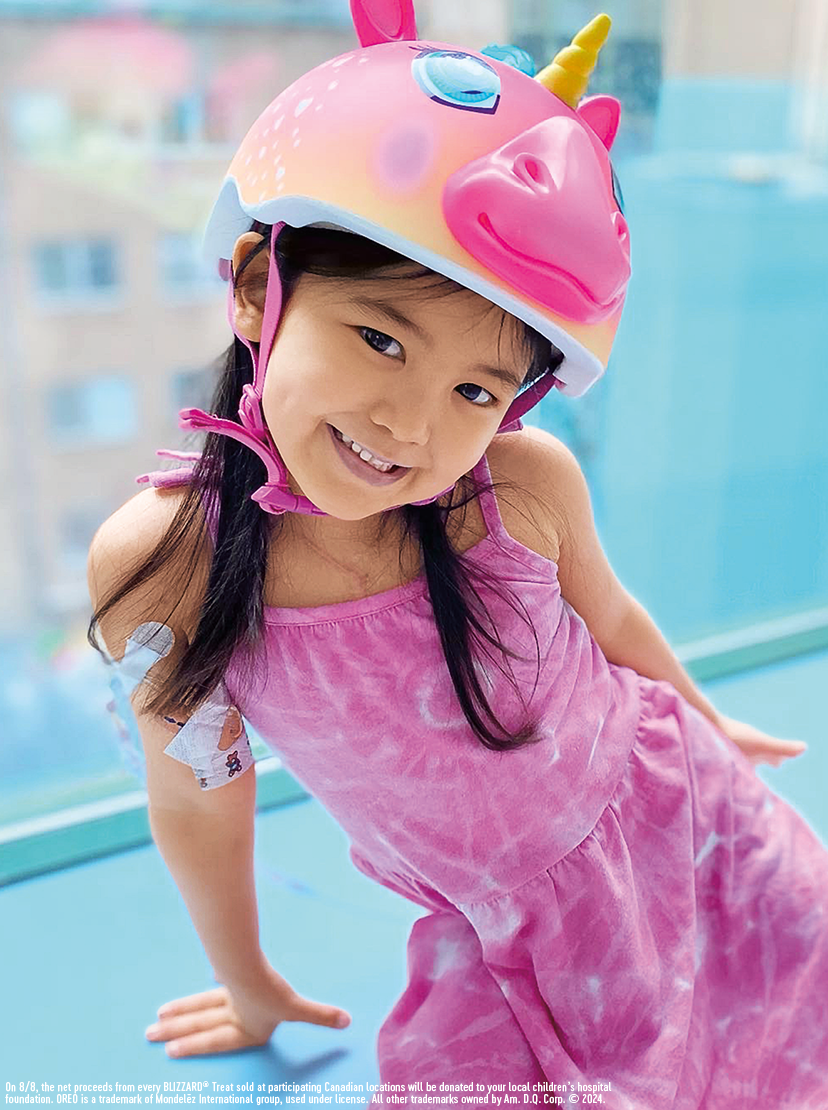 Young girl with a bike helmet